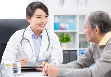 Doctor talking to patient